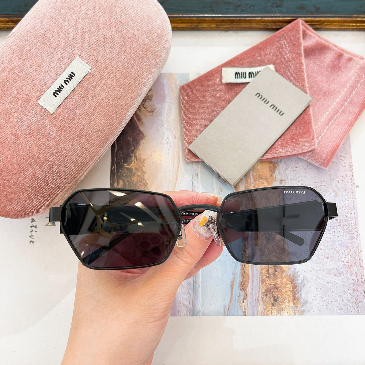 MIU M SUNGLASSES