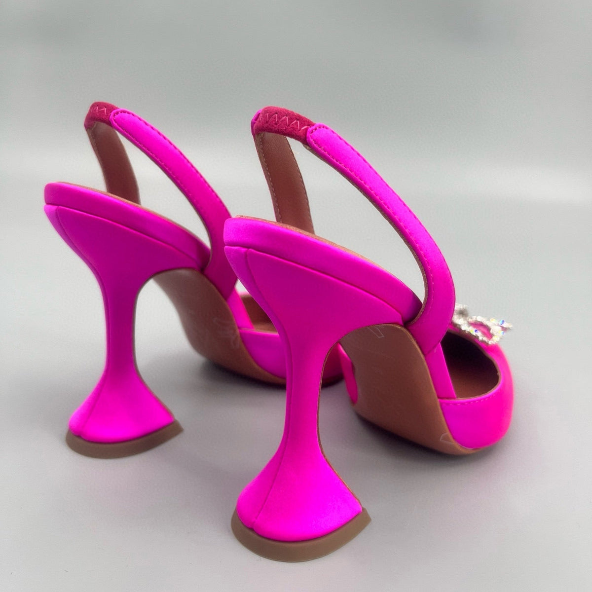 AMINA M HEELS