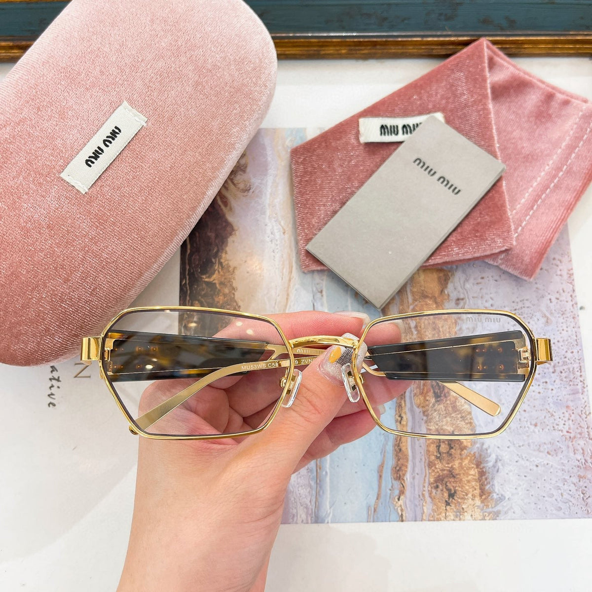 MIU M SUNGLASSES
