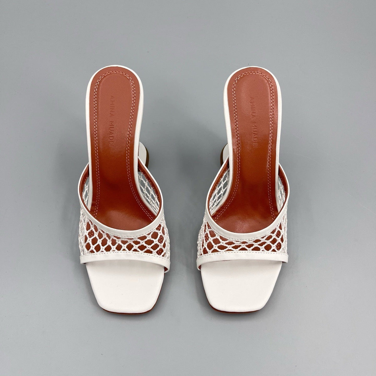 AMINA M HEELS