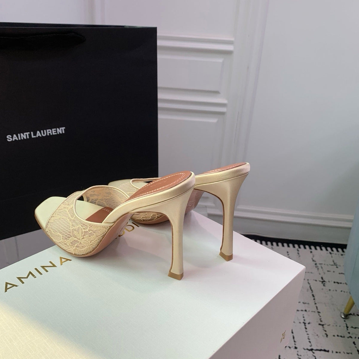 AMINA M HEELS