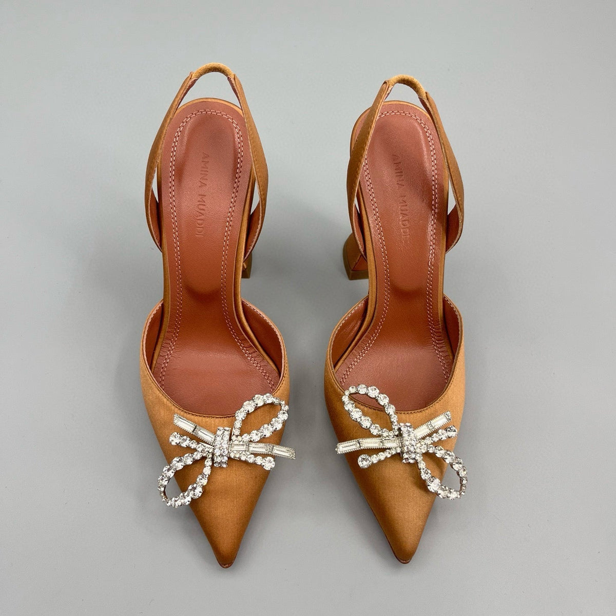 AMINA M HEELS