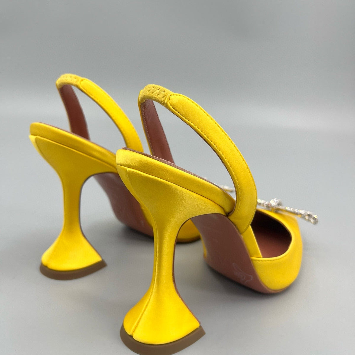 AMINA M HEELS