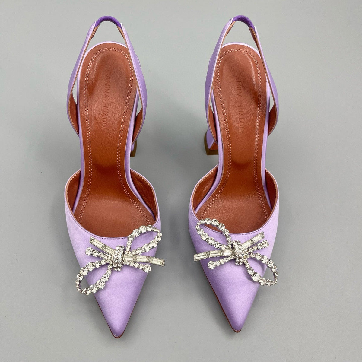 AMINA M HEELS