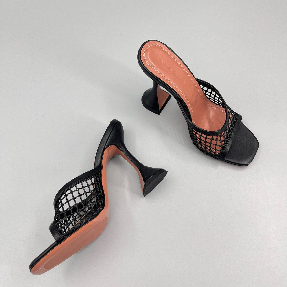AMINA M HEELS