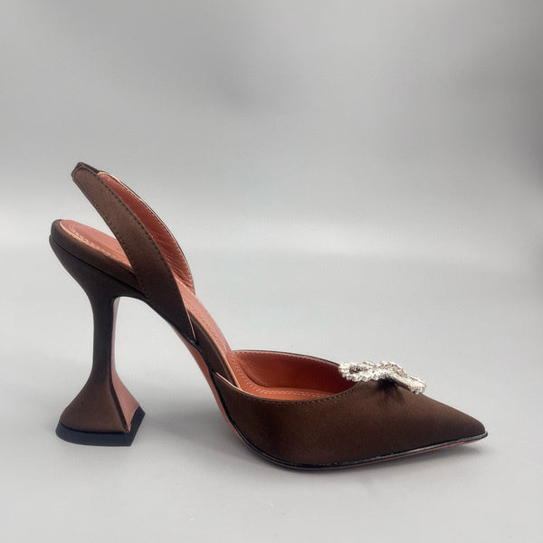 AMINA M HEELS