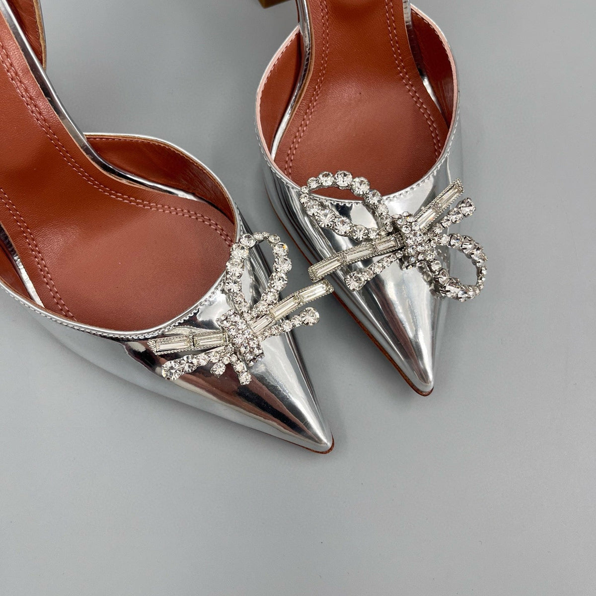 AMINA M HEELS