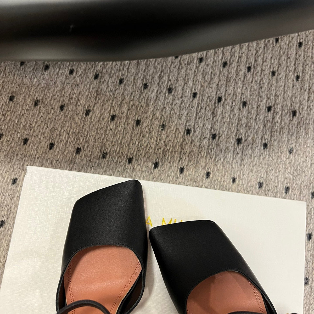 AMINA M HEELS