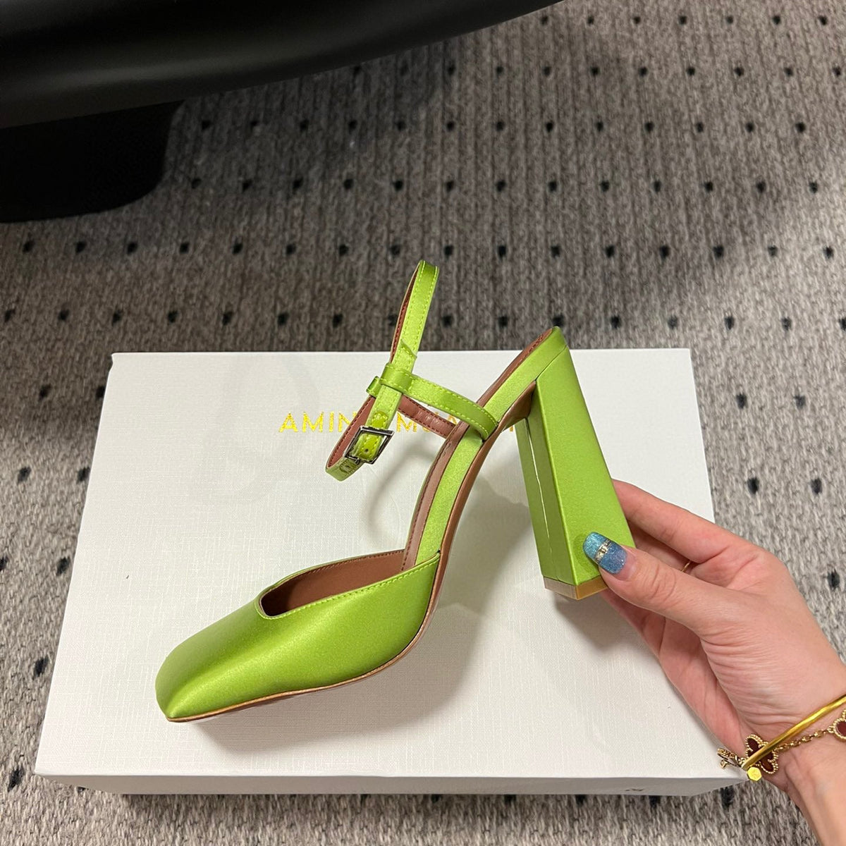 AMINA M HEELS
