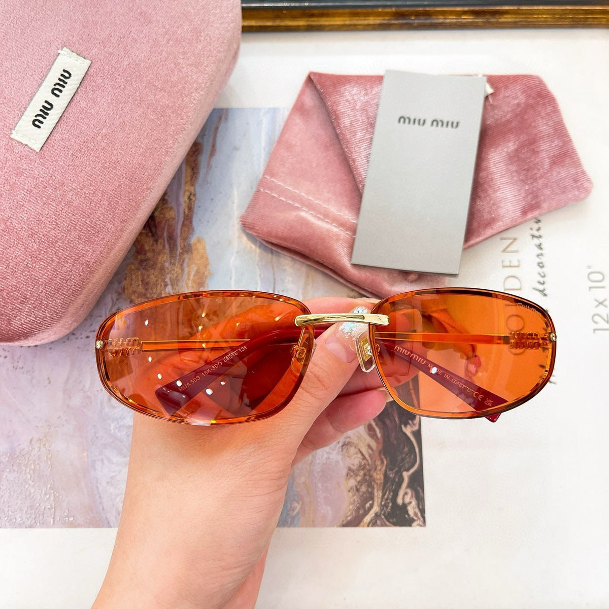 MIU M SUNGLASSES