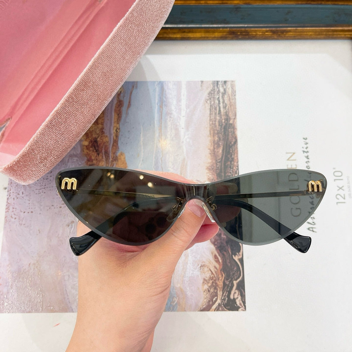MIU M SUNGLASSES