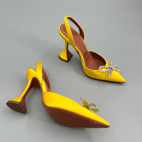 AMINA M HEELS