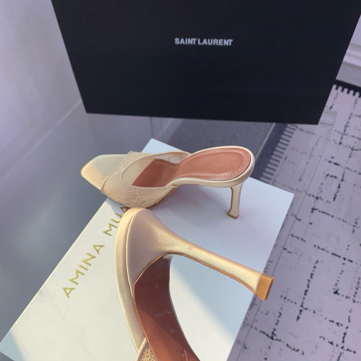 AMINA M HEELS