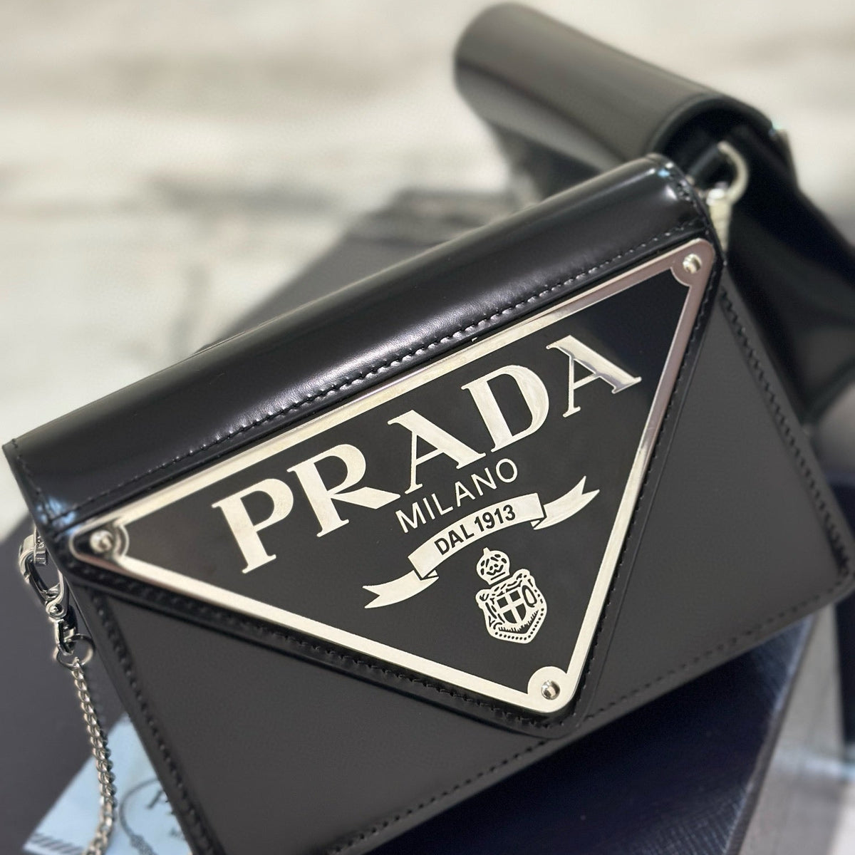 PD TRIANGLE LOGO BUFFED SHOULDER BAG