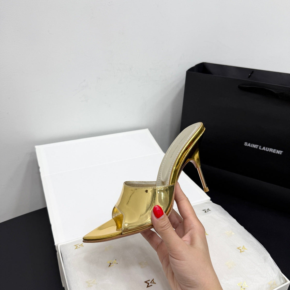 AMINA M HEELS