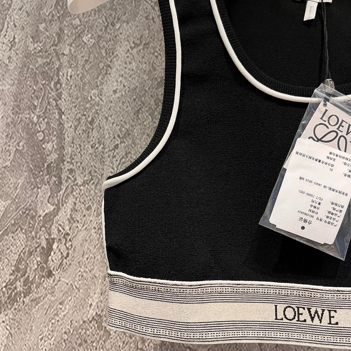 LOEW TOP