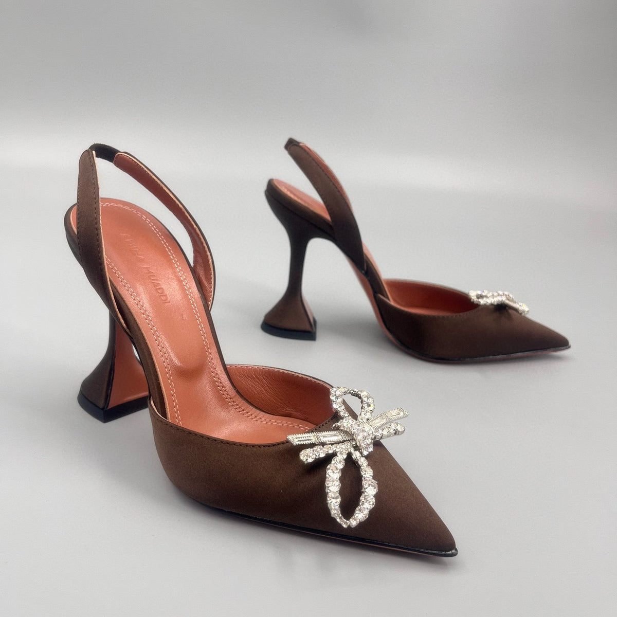 AMINA M HEELS