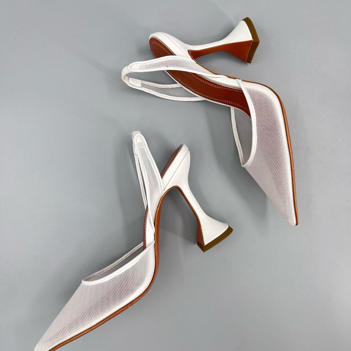 AMINA M HEELS