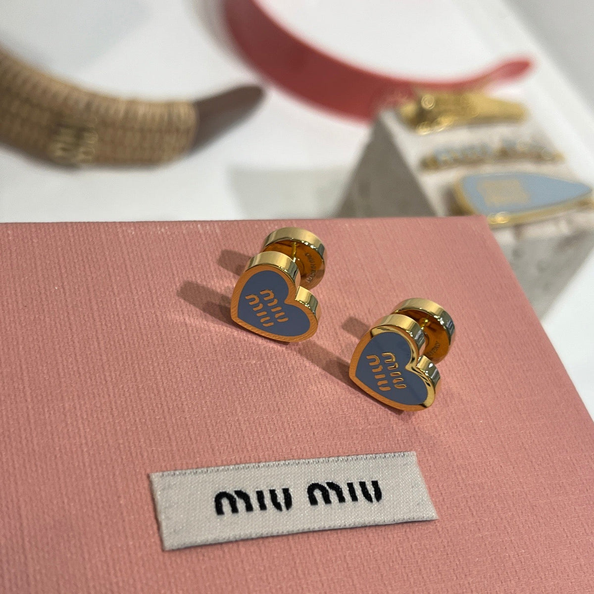 MIU M EARRINGS