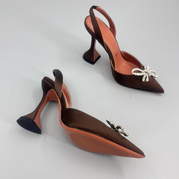 AMINA M HEELS
