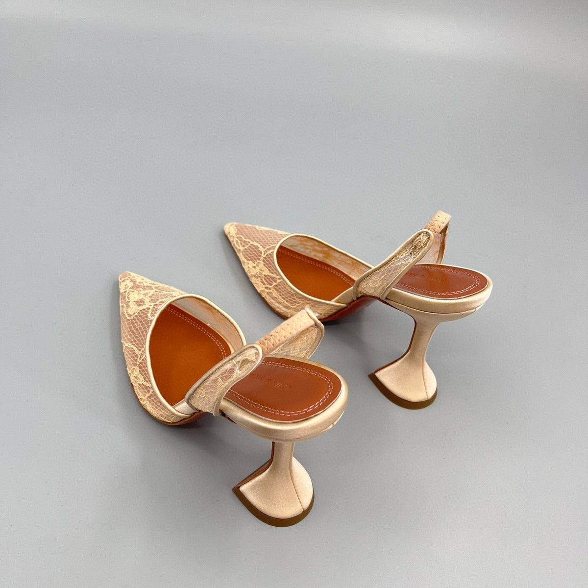 AMINA M HEELS