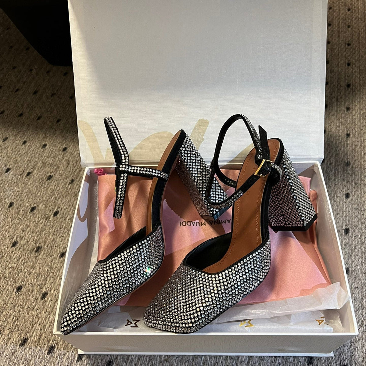 AMINA M HEELS