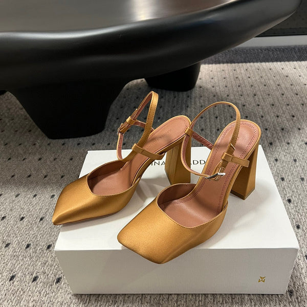 AMINA M HEELS