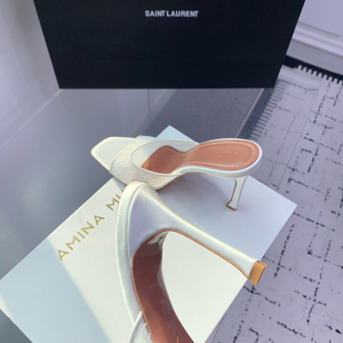 AMINA M HEELS