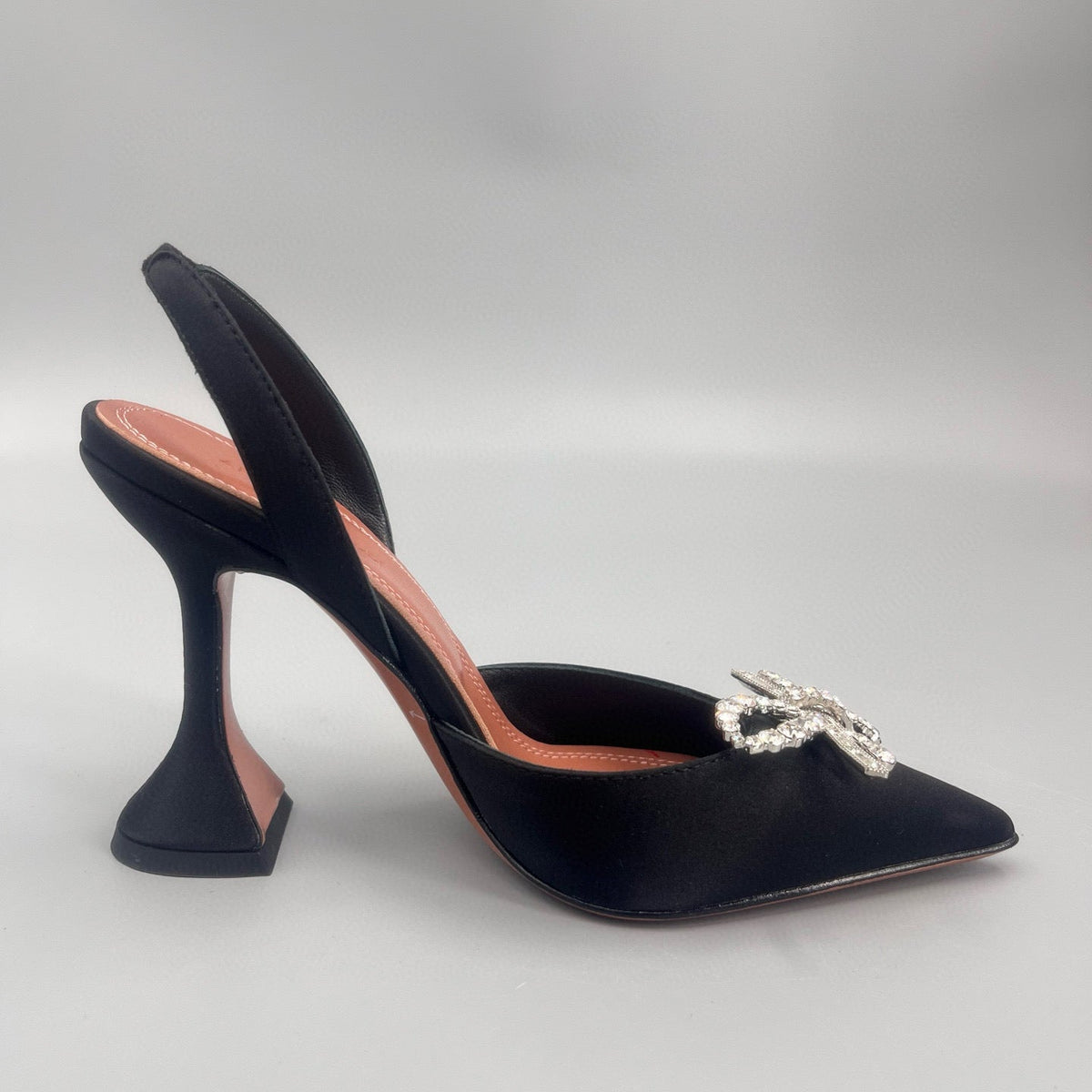 AMINA M HEELS