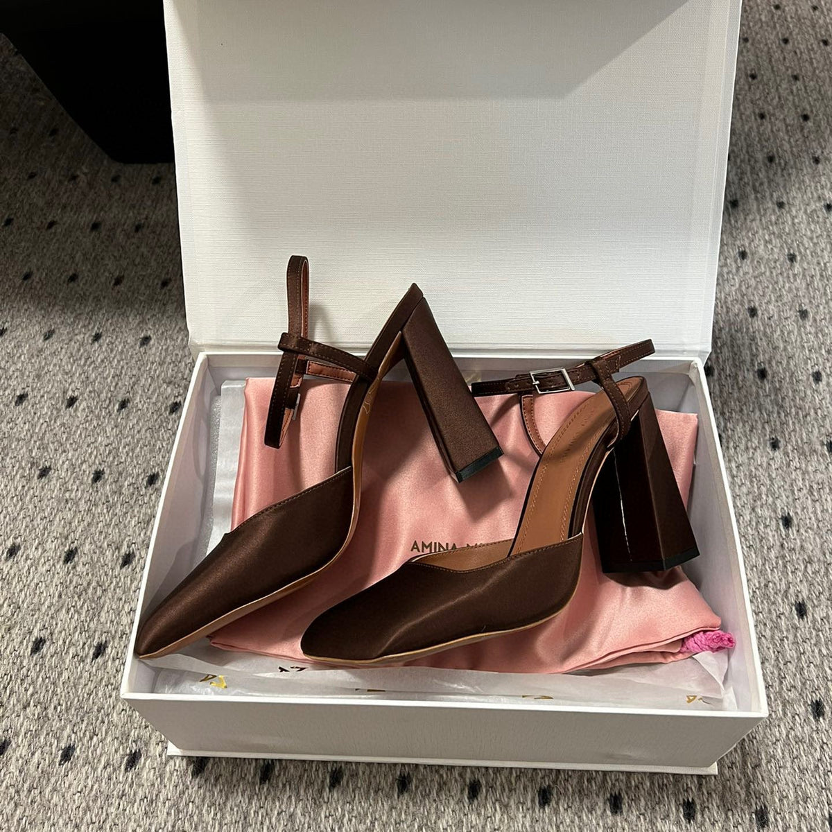 AMINA M HEELS