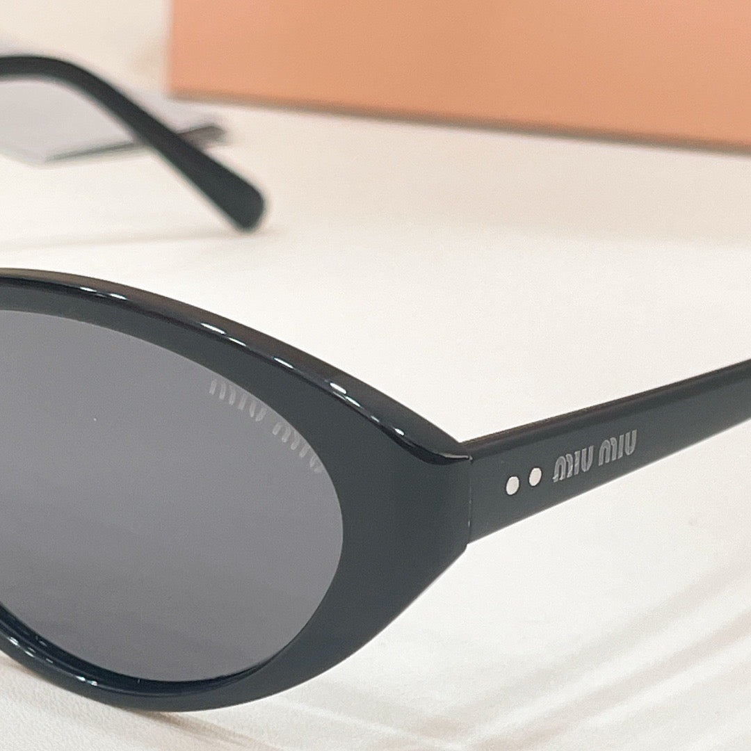 MIU M SUNGLASSES