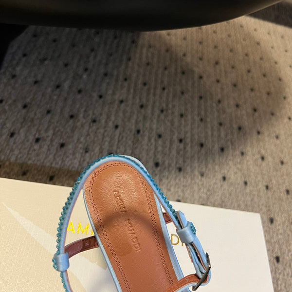 AMINA M HEELS