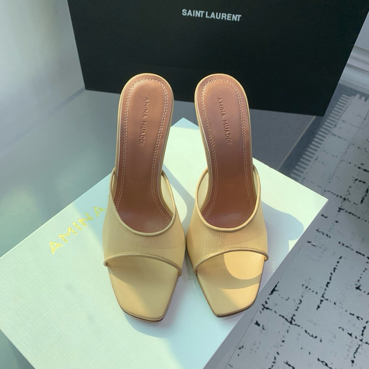 AMINA M HEELS