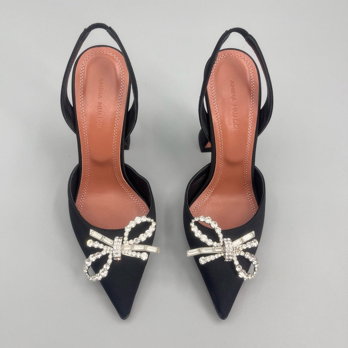AMINA M HEELS