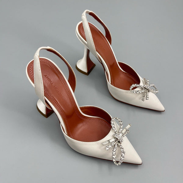 AMINA M HEELS