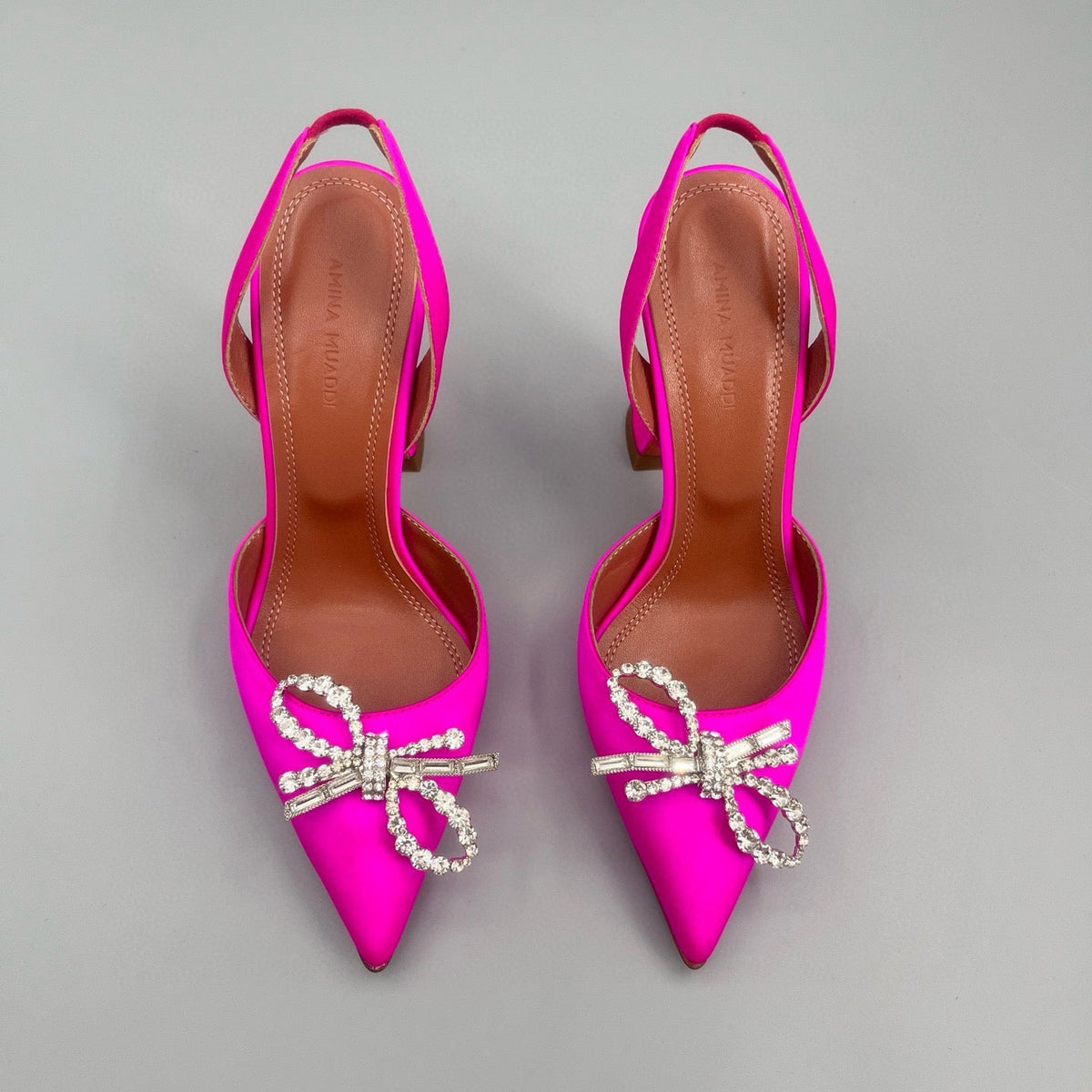 AMINA M HEELS
