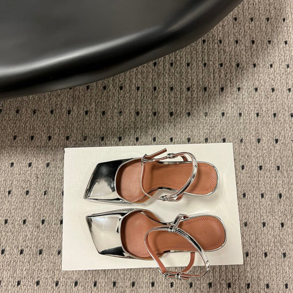 AMINA M HEELS