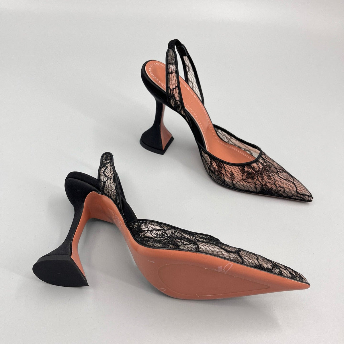 AMINA M HEELS