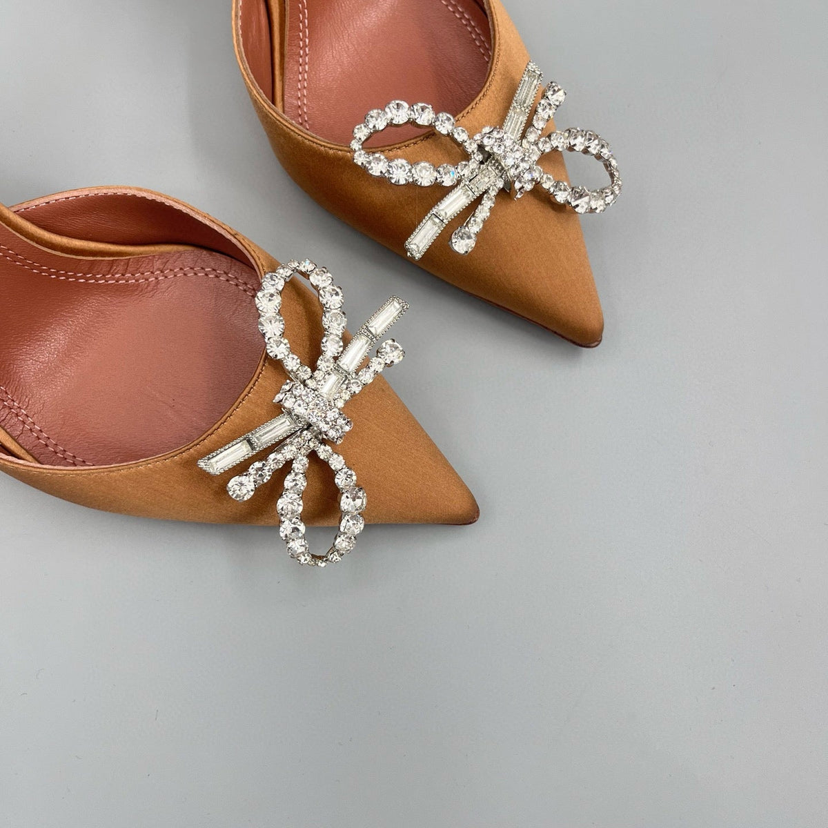AMINA M HEELS