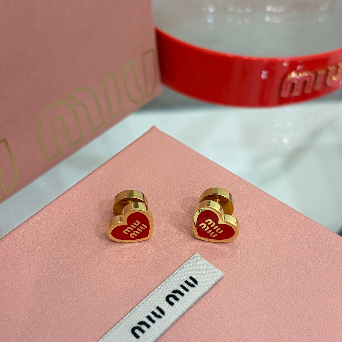 MIU M EARRINGS