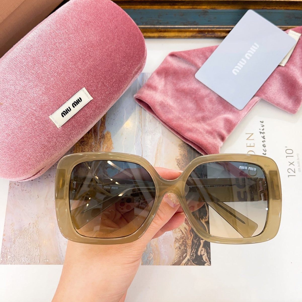 MIU M SUNGLASSES