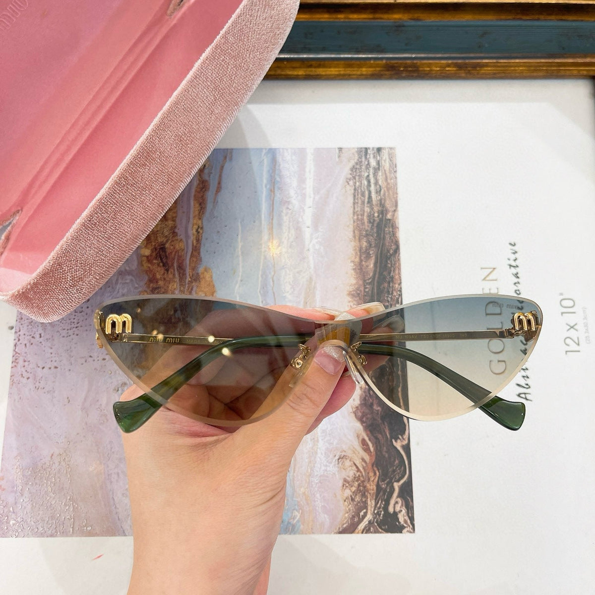 MIU M SUNGLASSES