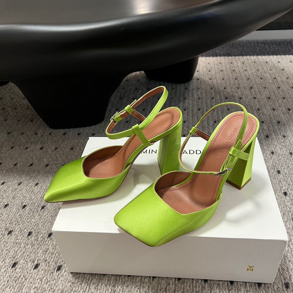 AMINA M HEELS