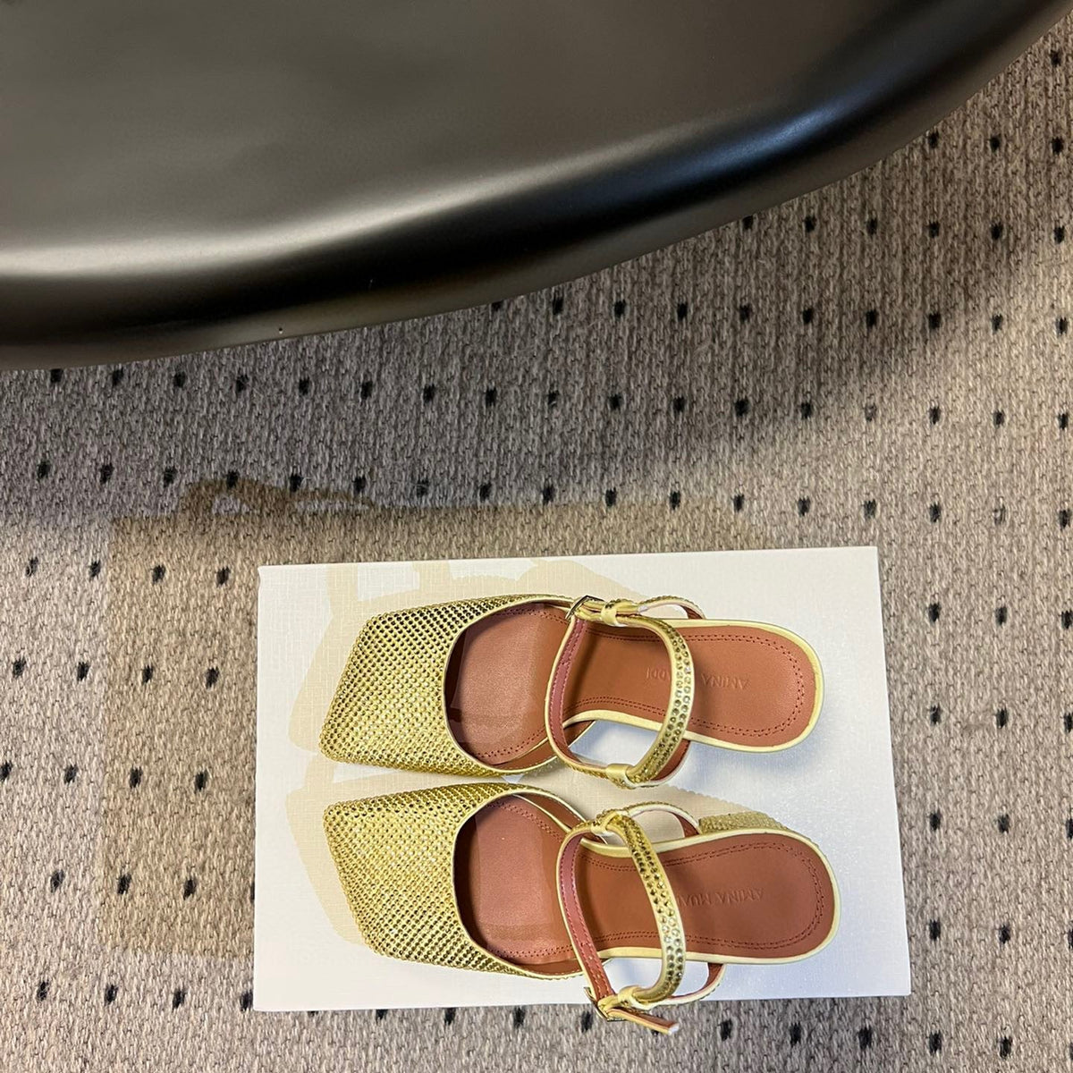 AMINA M HEELS