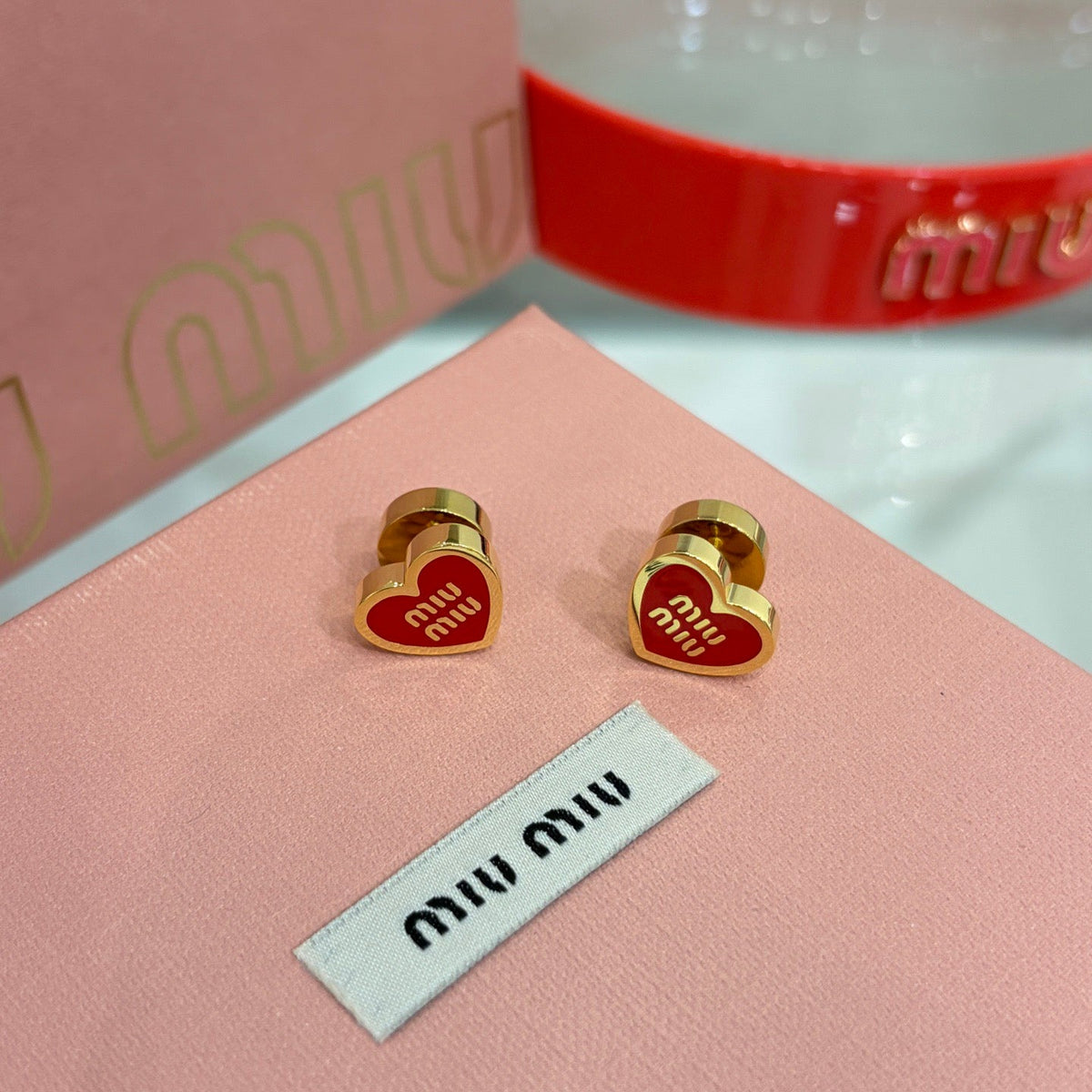 MIU M EARRINGS