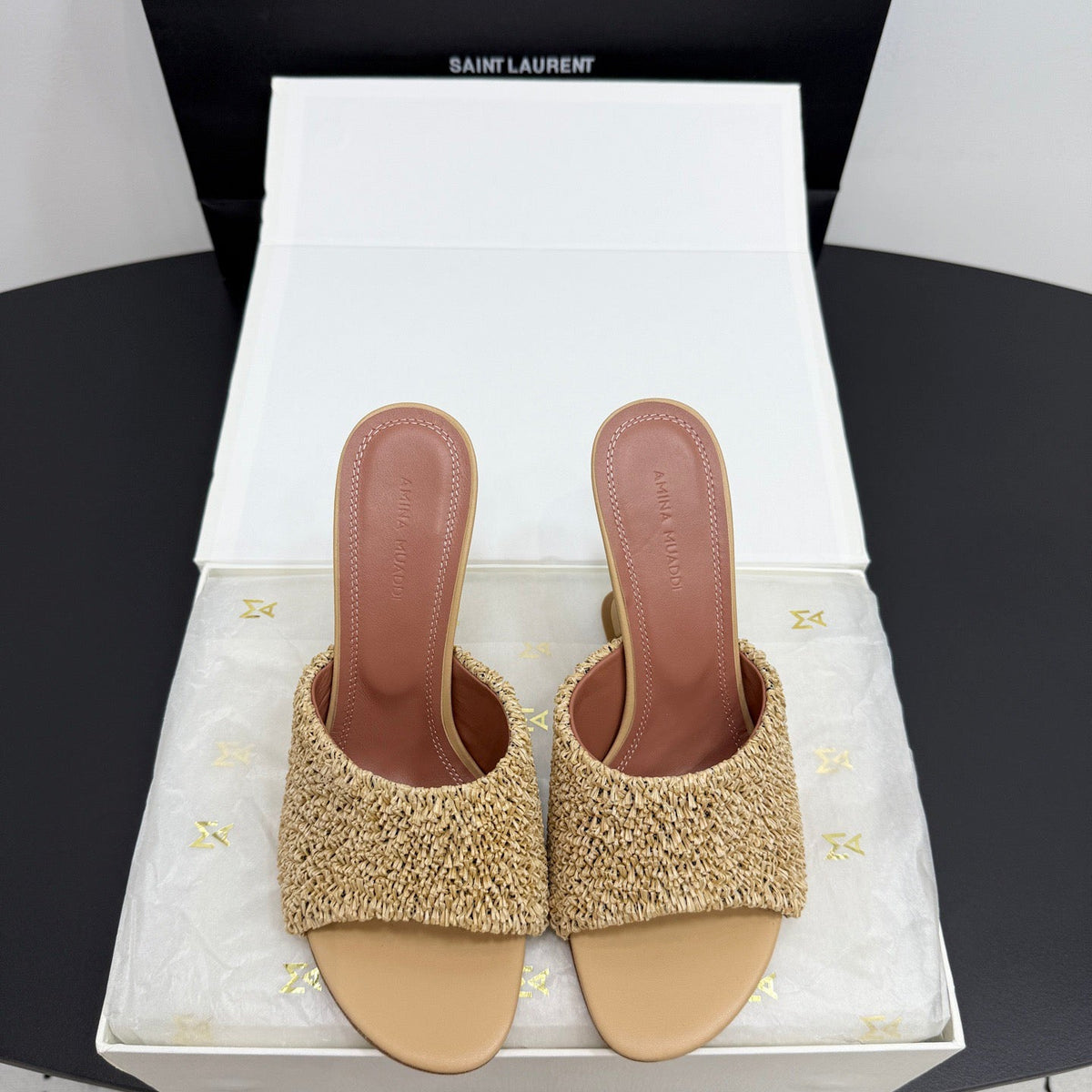 AMINA M HEELS