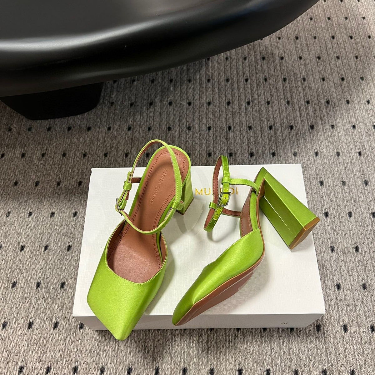 AMINA M HEELS