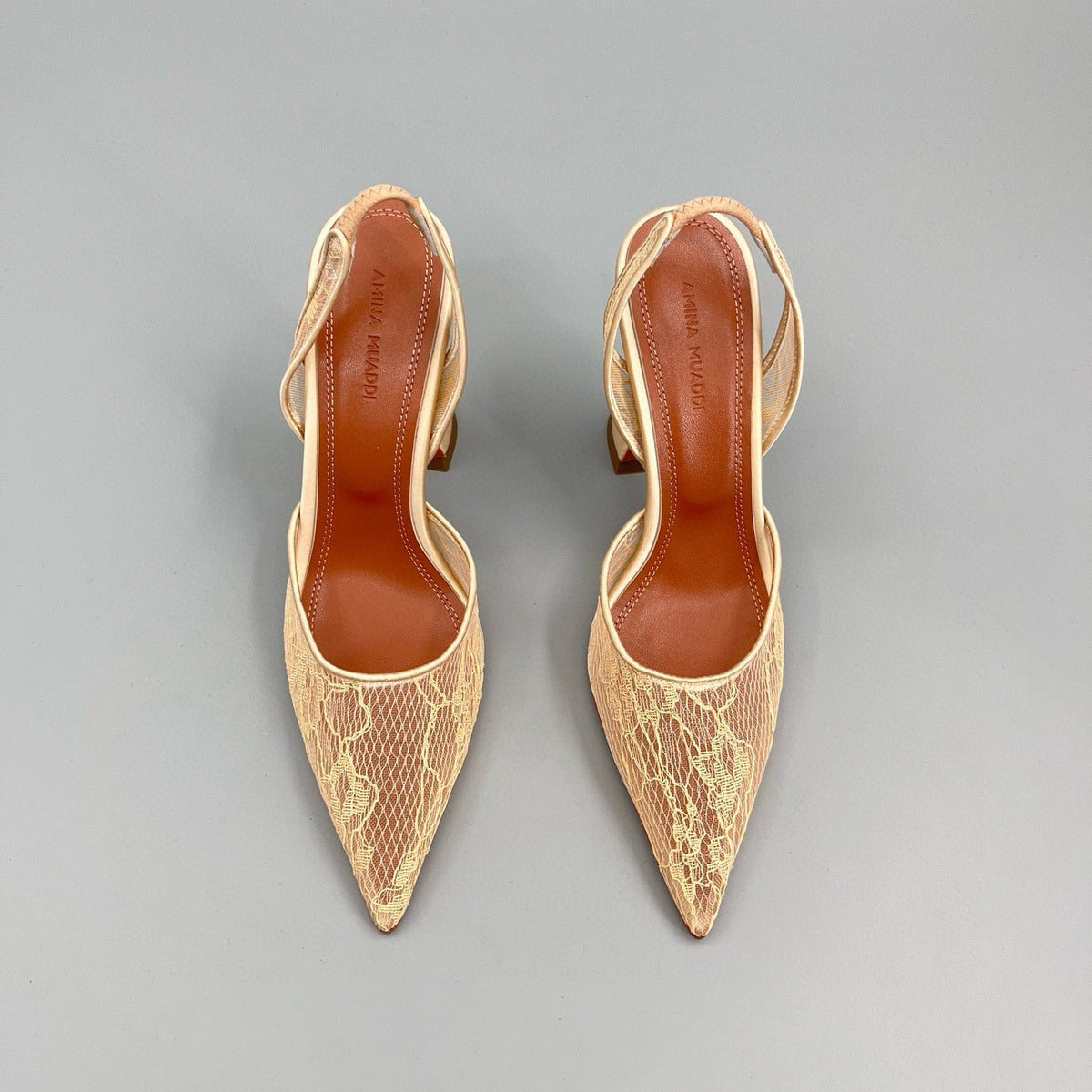 AMINA M HEELS