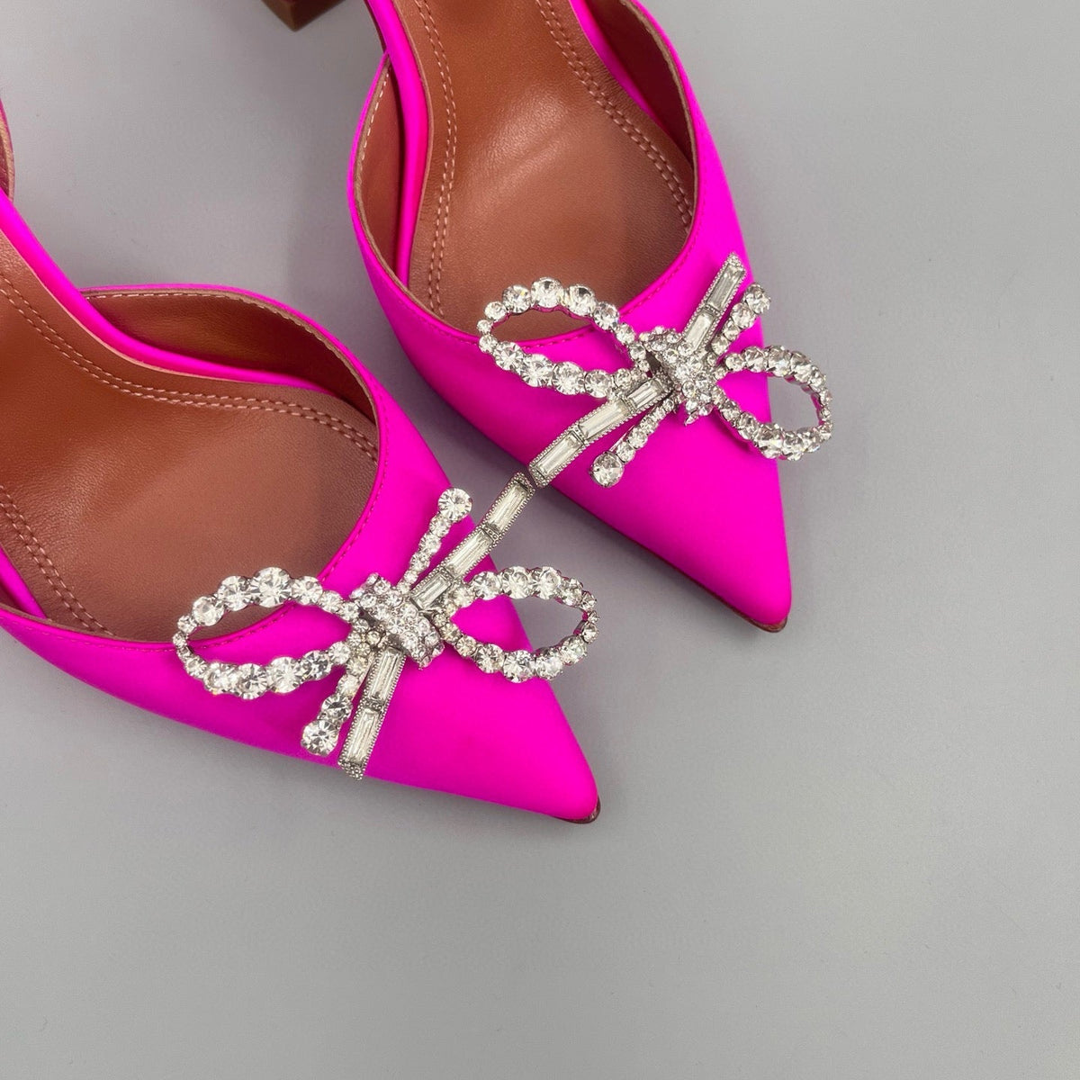 AMINA M HEELS