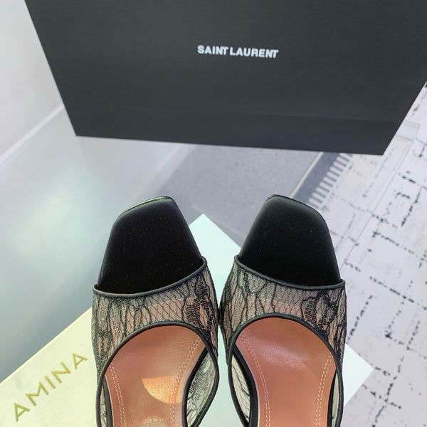 AMINA M HEELS